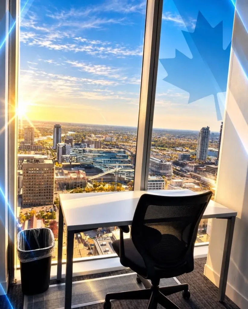 A desk by the window in the Calgary office, overlooking downtown